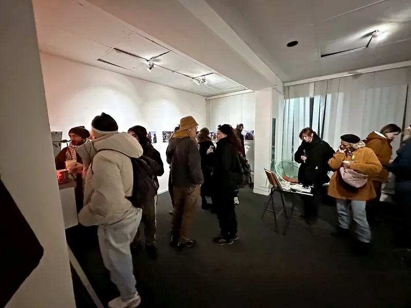 Busy opening night in the KOTTIWORX event space at Kottbusser Tor, Berlin – guests talking in the gallery room